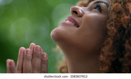 Black Woman Praying To God Looking Up To Sky With HOPE