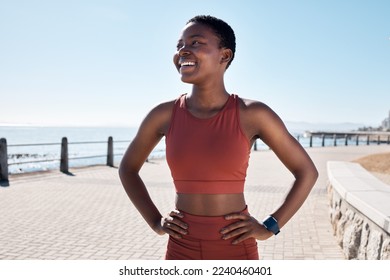 Black woman runner, smile and happy by sea promenade for health, fitness and summer body goals. Happy running workout, training and exercise by ocean for wellness, muscle and development in Sydney - Powered by Shutterstock