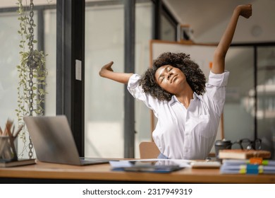 Black woman stretching due to pain from work, tried from work, stretch oneself	
 - Powered by Shutterstock