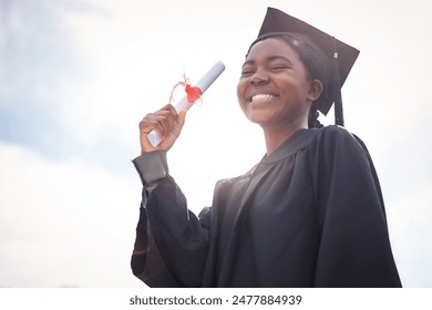 Black woman, student and graduation or diploma on sky background, university goals and education success achievement. Certificate, below and college or future with space, outside and academic degree - Powered by Shutterstock