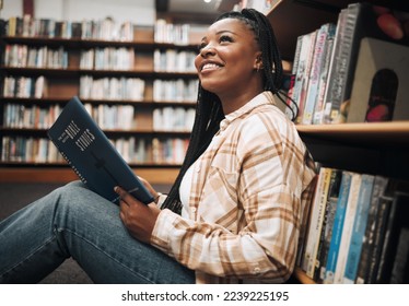 Black woman student, reading or library floor for religion, study or bible in research, focus or learning. African college student, christian education or studying god book for knowledge in Chicago - Shutterstock ID 2239225195