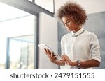 Black woman, tablet and office with company reading, career with public relations and social media management. Female person, ebook and website research in workplace, technology for event planning