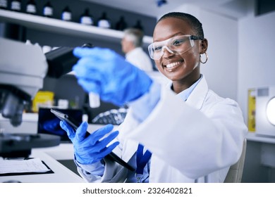 Black woman, test tube or happy scientist with tablet for pharmaceutical research, innovation or medicine. Medical data, smile or African biologist in science analysis in laboratory studying a cure - Powered by Shutterstock