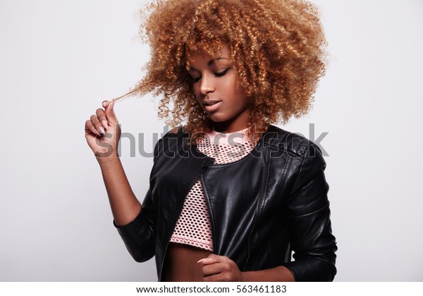 Black Woman Toches Her Curly Blonde Stock Photo Edit Now 563461183