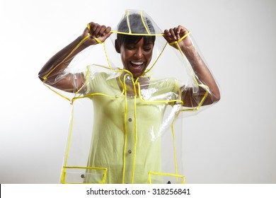 Black Woman In Transparent Raincoat