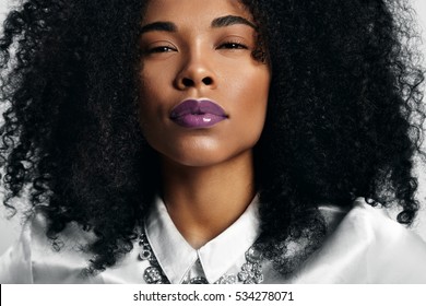 Black Woman With Trendy Violet Glossy Lips