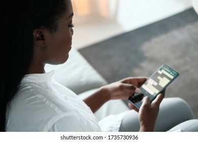 Black Woman Using Mobile Phone For Text Messaging - Shutterstock ID 1735730936