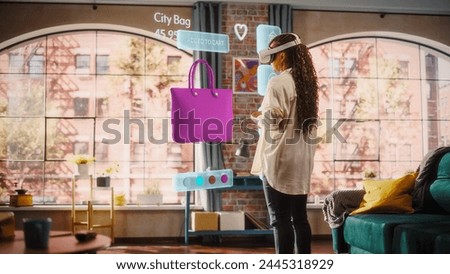 Black Woman Using Virtual Reality Headset for Online Shopping, Browsing through Cool Handbags items. Ordering from Mock-up Internet Store App for e-Commerce products. Augmented Reality Concept.