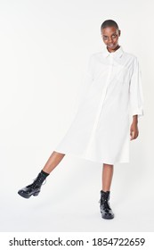 Black Woman Wearing Black Ankle Boots In A White Dress Mockup