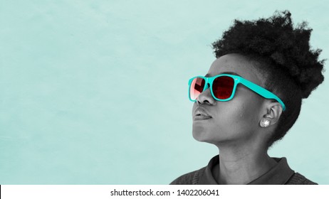 Black Woman Wearing Teal Sunglasses