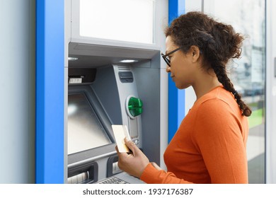 Black Woman While Withdrawing Money At ATM