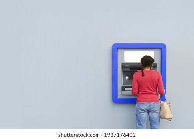 Black Woman While Withdrawing Money At ATM