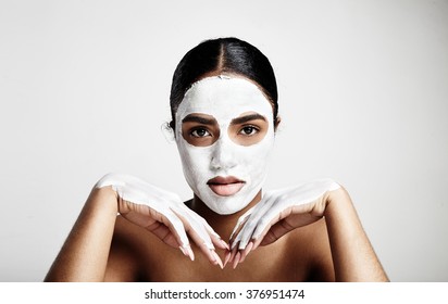 Black Woman With White Clay Facial Mask