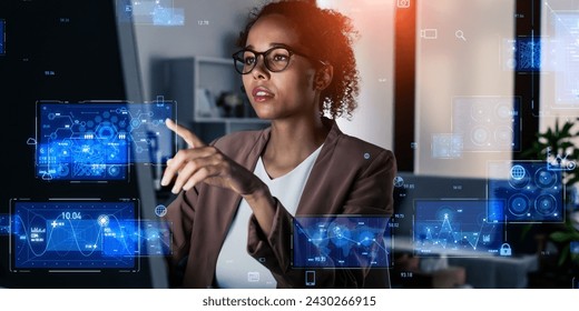 Black woman working in the office and digital technology concept.