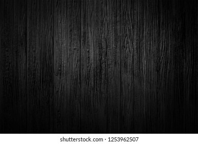 Black wood texture background coming from natural tree. Wooden panel with beautiful patterns. Space for work