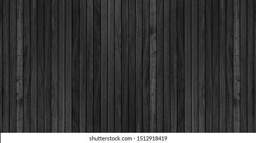 Black wood texture wall for background.