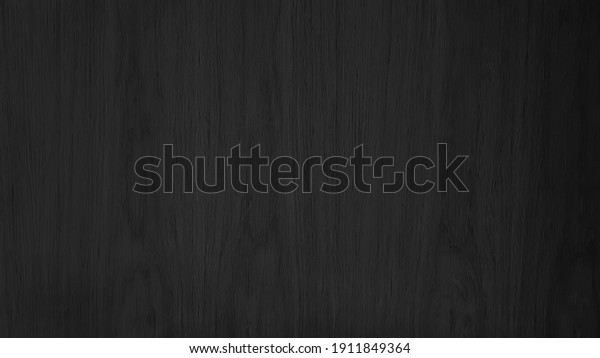 black wooden\
background. walnuts ,oak or sepia wooden texture with soft wood\
grains. abstrtact wood\
background.
