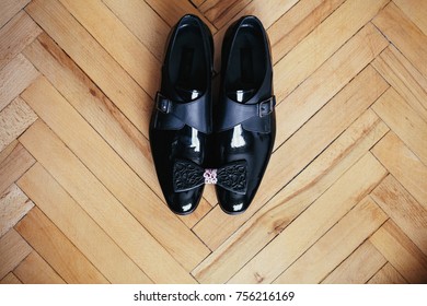 Black wooden bow tie lies lacquer leather shoes - Shutterstock ID 756216169