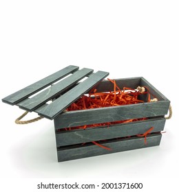 Black Wooden Box For Packing Gifts. Lattice Cover, Rope Handles. Inside There Is A Red Straw Filler. Isolated On White Background