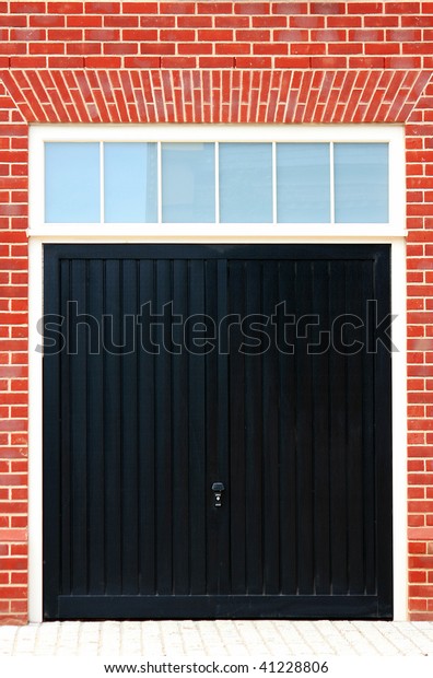 Black Wooden Garage Doors Red Brick Stock Photo Edit Now 41228806