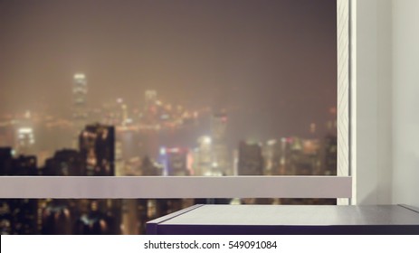 Black Wooden Table At Glass Window Of City Night View 