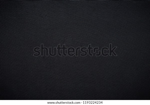 Black woven\
carbon fiber sheet texture\
background