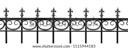 Black wrought iron front garden. Metal fence made of forged steel. Close up. Isolated on white background.