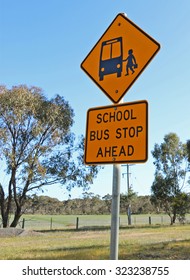 Black And Yellow School Bus Stop Ahead Sign