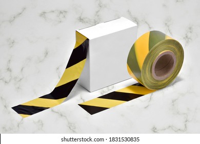 Black and yellow tape box for barrier and signaling.