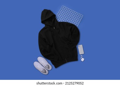 Black Zip Hoodie With Creative Flay Lay Concept Isolated On Plain Background