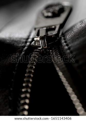 Black zipper on leather jacket close-up Foto d'archivio © 