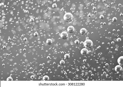 Black-and-white Macro Oxygen Bubbles In Wate