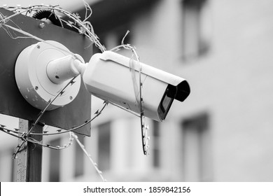 Black-and-white Photo, Close-up Security Camera. Criminal Facial Recognition Software. Security Concept. Security Concept.