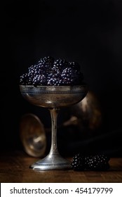 Blackberries In A Silver Old Cup In Dark Style Food Photography