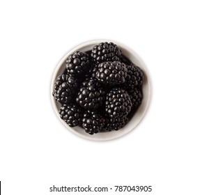 Blackberries In A White Bowl. Berries With Copy Space For Text. Ripe And Tasty Berry Isolated On White. Blackberries On A White Background. Top View.