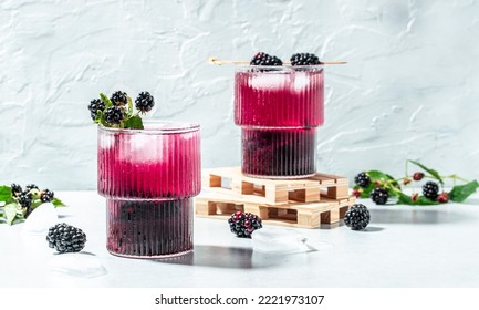 Blackberry cocktail on a light background. banner, menu, recipe place for text, top view. - Powered by Shutterstock