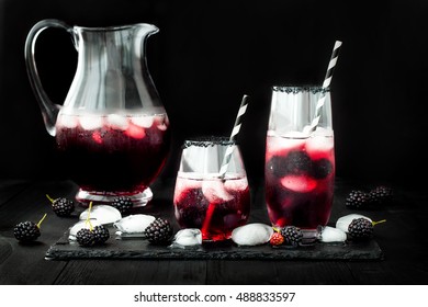 Blackberry Drink In Glasses With Black Sugar Rim For Fall And Halloween Parties