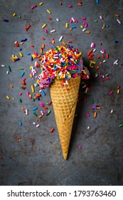 Blackberry Ice Cream Cone With Rainbow Sprinkles