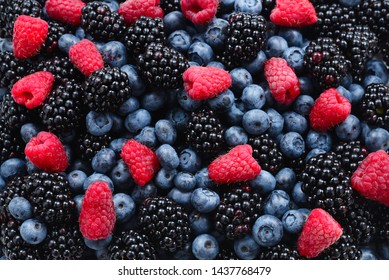 Blackberry, raspberry, blueberry background.  Top view. - Powered by Shutterstock