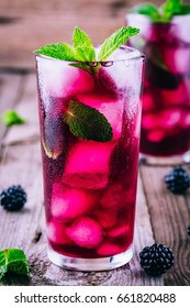 Blackberry Smash  Cocktail  With Lime,  Mint And Ice