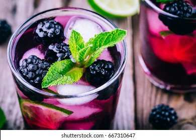 Blackberry Smash Cold Cocktail  With Lime,  Mint And Ice