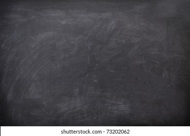 Blackboard / chalkboard texture. Empty blank black chalkboard with chalk traces - Shutterstock ID 73202062