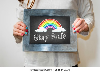 Blackboard Drawing With Rainbow And The Words Stay Safe