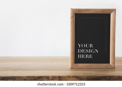 Blackboard In Frame With Text Your Design Here On White 