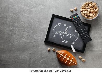 Blackboard with game strategy and rugby ball - Powered by Shutterstock