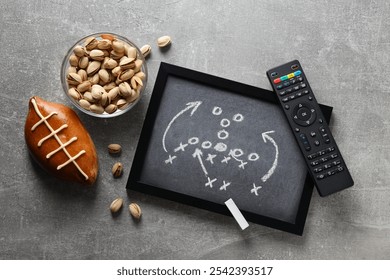 Blackboard with game strategy and rugby ball - Powered by Shutterstock