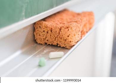 Blackboard, sponge and chalk - preparation for the lesson