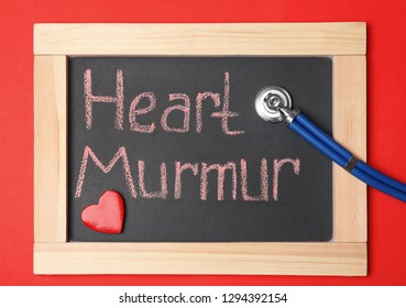 Blackboard With Text HEART MURMUR And Stethoscope On Color Background, Top View