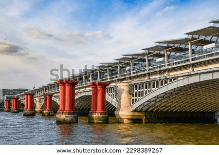 Blackfriars Bridge is a road and foot traffic bridge over the River Thames in London, between Waterloo Bridge and Blackfriars Railway Bridge, carrying the A201 road. The north end is in the City 