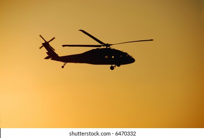 Blackhawk Helicopter Against A Sunset Sky